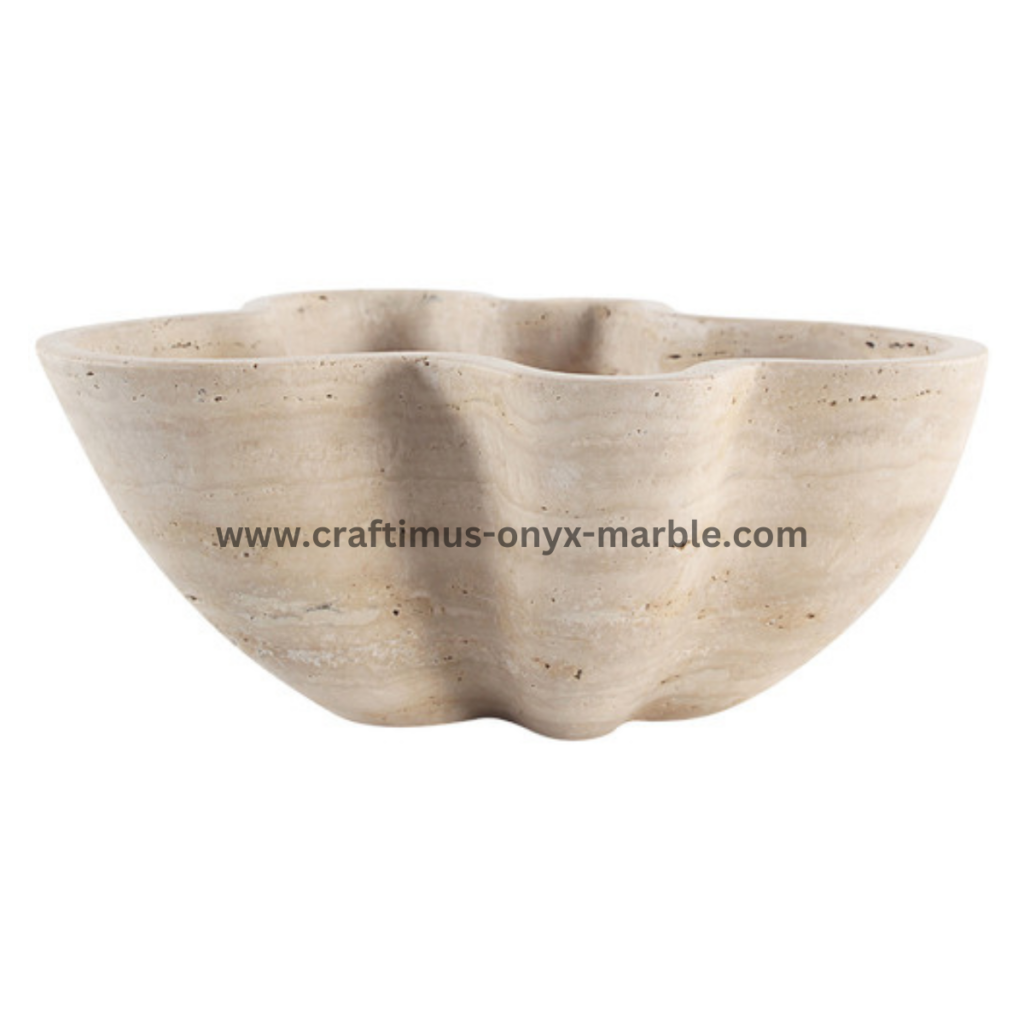 Handcrafted travertine stone bowl made in Pakistan for home decor and interior design.