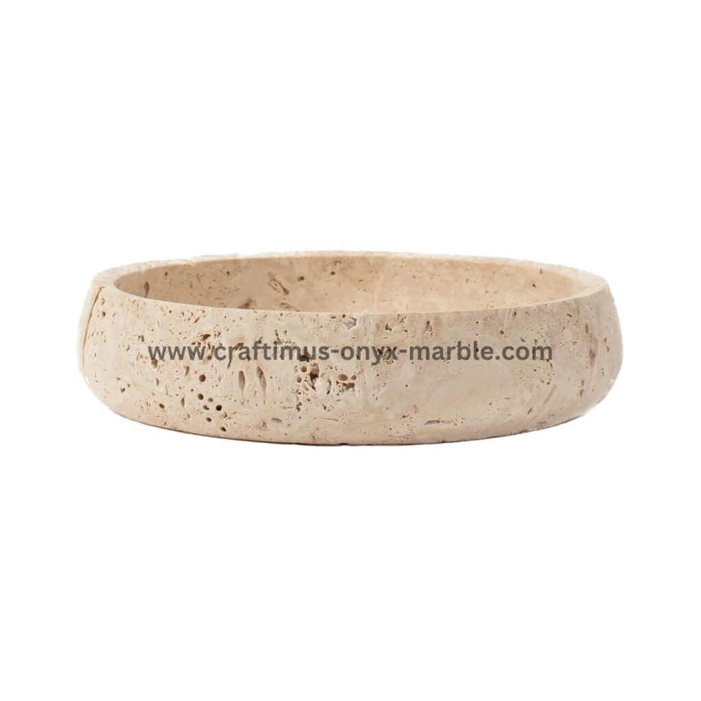 Handcrafted travertine stone bowl made in Pakistan for home decor and interior design.