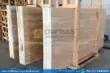 Stacked beige travertine stone slabs