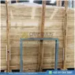 Dark beige Travertine Slabs on display in factory