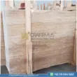 Dark beige Travertine Slabs on display in factory