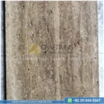 Dark beige Travertine Slabs on display in factory