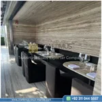 Dark beige Travertine Slabs on display in factory