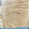 Dark beige Travertine Slabs on display in factory