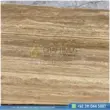 Dark beige Travertine Slabs on display in factory