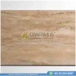 Dark beige Travertine Slabs on display in factory