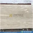 Dark beige Travertine Slabs on display in factory