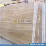Dark beige Travertine Slabs on display in factory