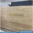 Dark beige Travertine Slabs on display in factory