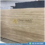 Dark beige Travertine Slabs on display in factory