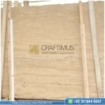 Dark beige Travertine Slabs on display in factory