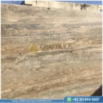 Dark beige Travertine Slabs on display in factory