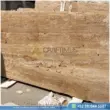 Dark beige Travertine Slabs on display in factory