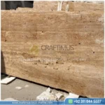 Dark beige Travertine Slabs on display in factory