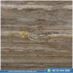 Dark beige Travertine Slabs on display in factory