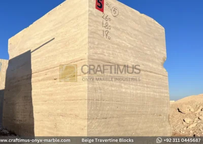 Classic Beige Travertine Blocks at a factory in Pakistan in background