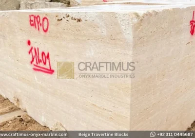 Classic Beige Travertine Blocks at a factory in Pakistan in background