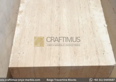 Classic Beige Travertine Blocks at a factory in Pakistan in background