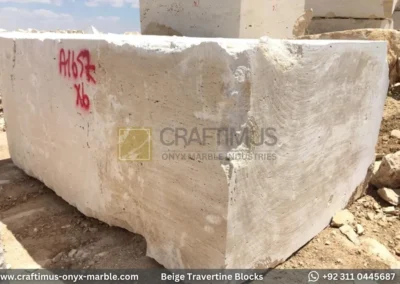 Classic Beige Travertine Blocks at a factory in Pakistan in background