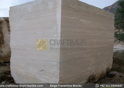 Classic Beige Travertine Blocks at a factory in Pakistan in background