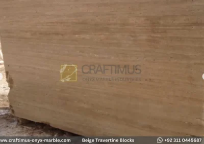 Classic Beige Travertine Blocks at a factory in Pakistan in background