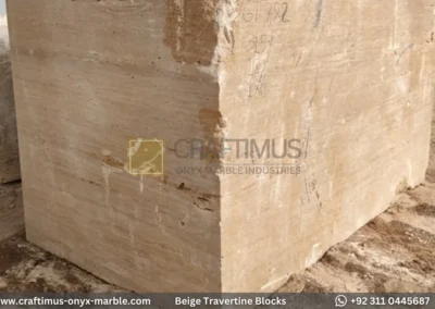 Classic Beige Travertine Blocks at a factory in Pakistan in background