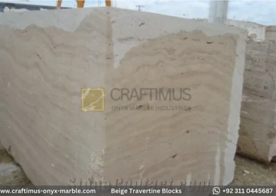 Classic Beige Travertine Blocks at a factory in Pakistan in background