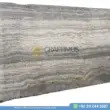 Silver Travertine Slabs Stacked in Factory