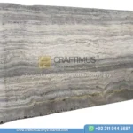 Silver Travertine Slabs Stacked in Factory