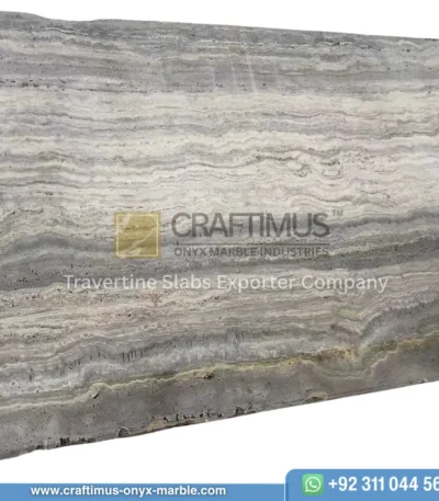 Silver Travertine Slabs Stacked in Factory