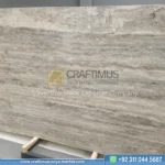 Silver Travertine Slabs Stacked in Factory