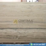 Silver Travertine Slabs Stacked in Factory