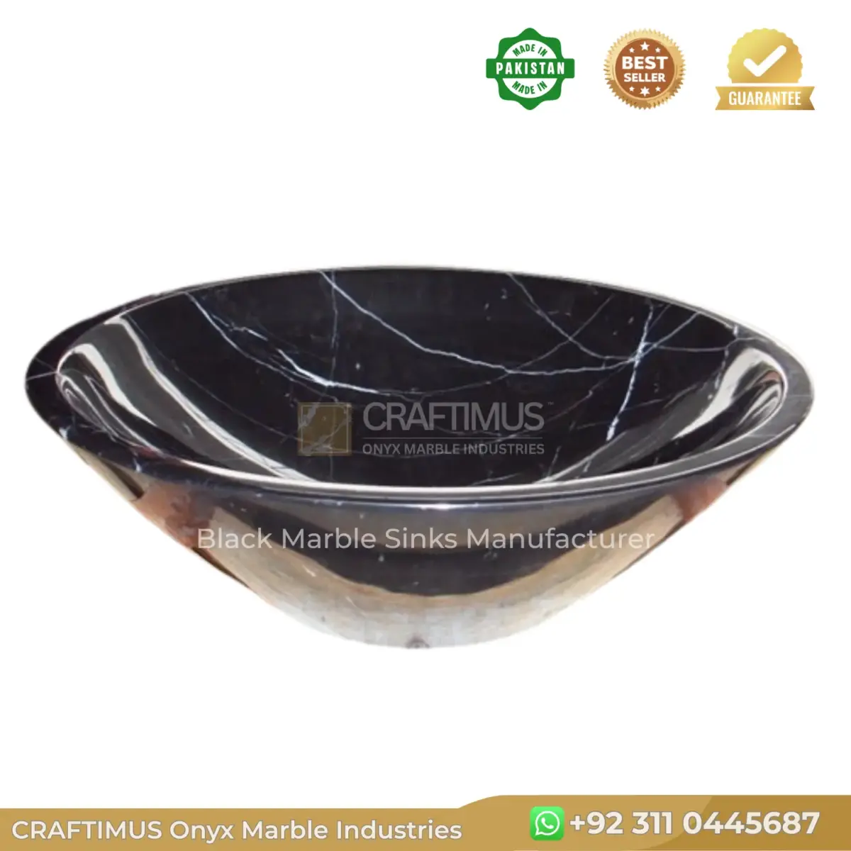 Black marble sink with elegant design and white veining, perfect for luxurious bathroom or kitchen decor.
