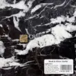 Black and white marble slab suitable for tiles, countertops, and bar tops. Elegant natural stone design.