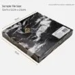 Black and white marble sample tile, 12cm x 12cm x 2.5cm, ideal for elegant flooring and countertops.