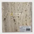Light beige travertine stone slab ideal for tiles, countertops, and wall cladding applications.
