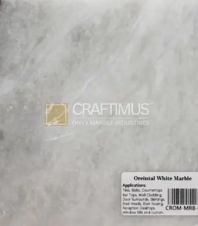 Oriental White Marble slab, elegant gray and white veining perfect for countertops and tiles.