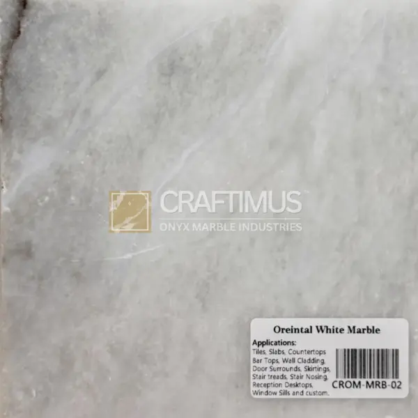 Oriental White Marble slab, elegant gray and white veining perfect for countertops and tiles.