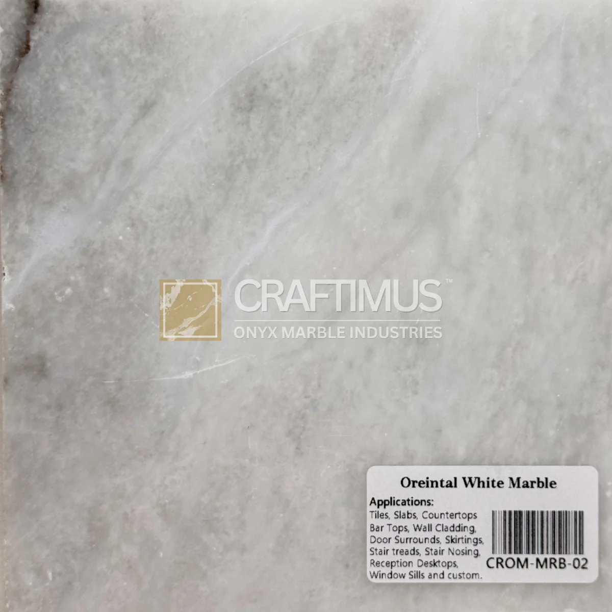 Oriental White Marble from Pakistani Quarries — Architect-Specified Alternative to Italian Imports with Factory-Direct Pricing Oriental White Marble slab, elegant gray and white veining perfect for countertops and tiles.