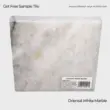 Oriental White Marble sample tile, showcasing a sleek design and elegant light gray color for versatile applications.