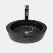 Black marble round vessel sinks with modern chrome faucet. Elegant design for stylish bathrooms.