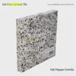 Salt and Pepper Granite, gray and black speckled natural stone tile sample.