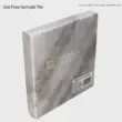 Shadow Grey Gold Marble tile sample with elegant veining and polished finish. Ideal for modern interiors.