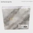 Shadow Grey Gold Marble sample tile, featuring elegant grey tones and natural veining pattern.