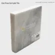 Shaded white marble sample tile in natural stone finish, ideal for elegant home decor.