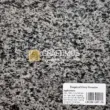 Tropical Grey Granite, natural stone countertop material, with a unique grey and black speckled texture.