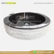 Black marble oval sink with unique veining and polished surface for modern bathrooms.