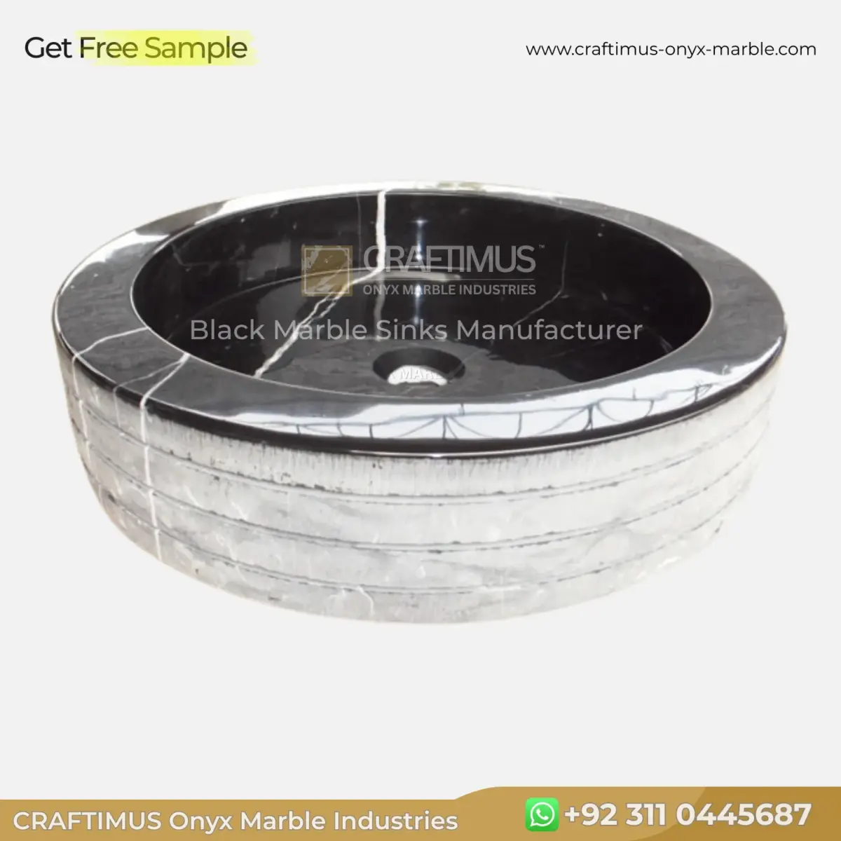 Black marble oval sink with unique veining and polished surface for modern bathrooms.