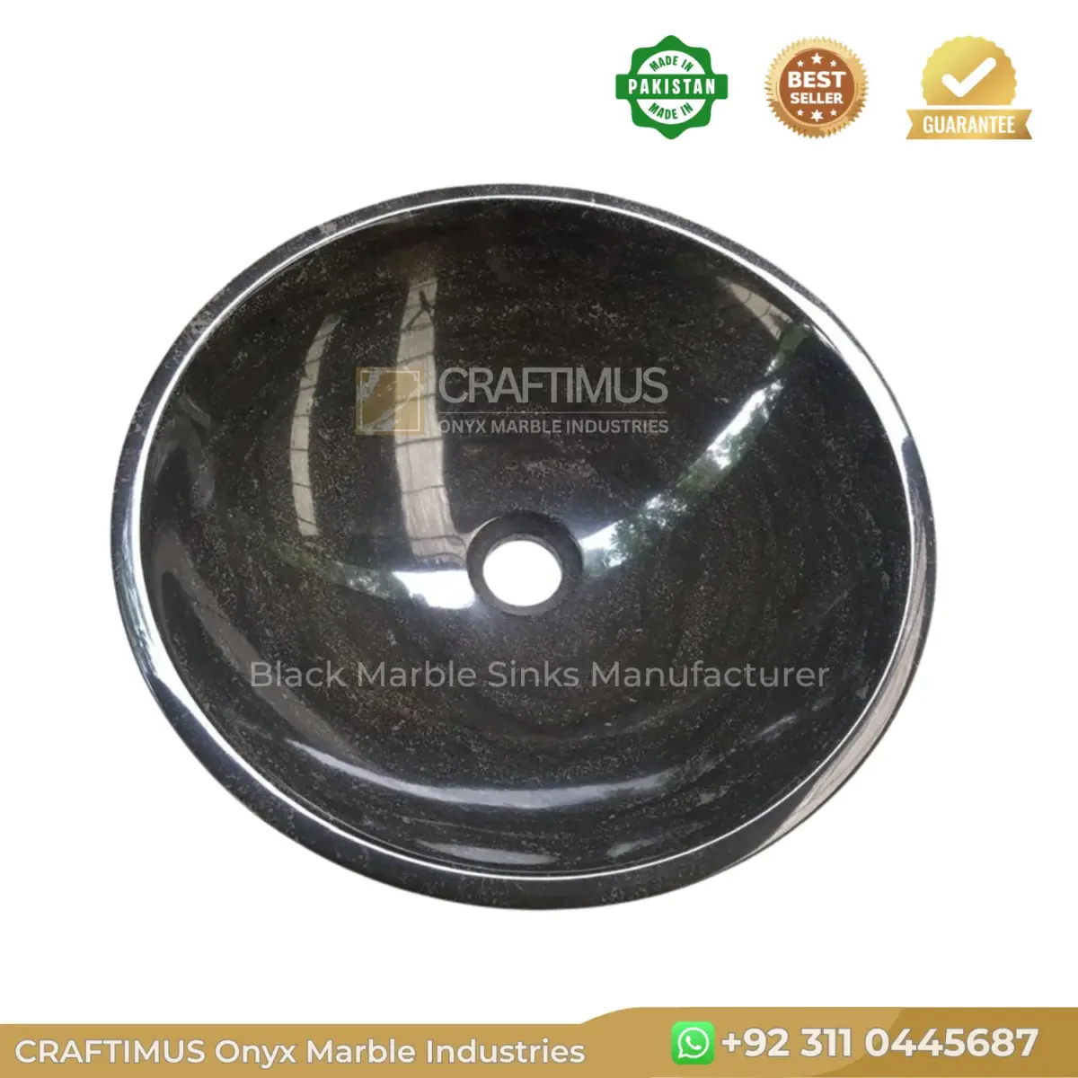 Black marble sink with a polished finish, ideal for stylish bathrooms and sinks.
