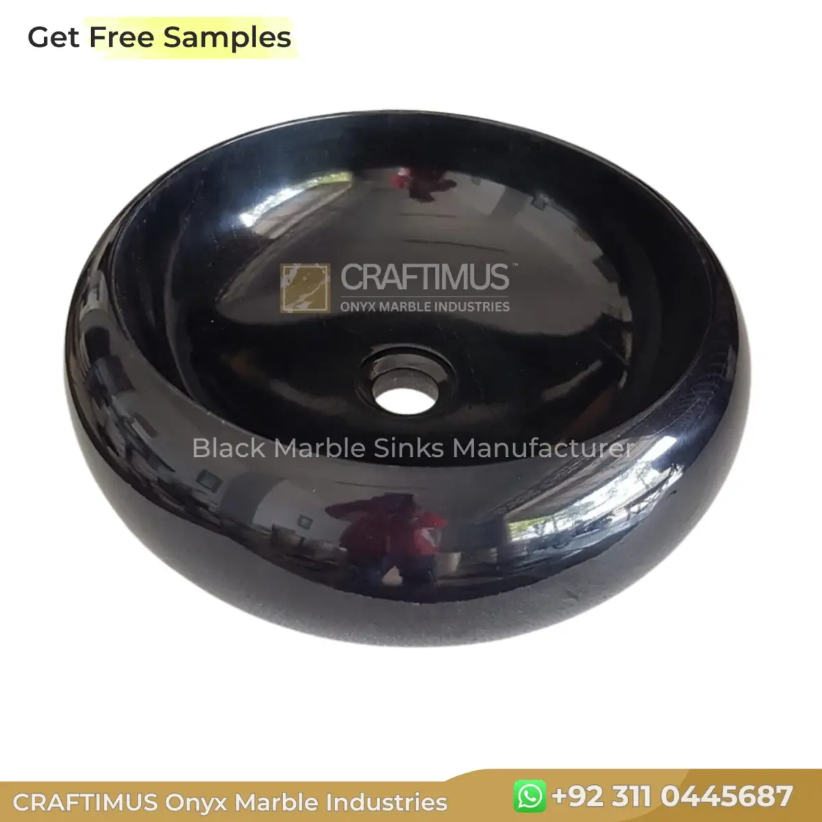 Black marble sink, round design, polished finish, perfect for elegant bathrooms and kitchens.
